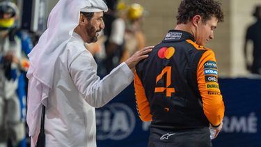 FIA president Mohammed Ben Sulayem (L) greets McLaren's British driver Lando Norris at the end of the qualifying session ahead of the Formula One Qatar Grand Prix at the Lusail International Circuit in Lusail on November 29, 2025. 
Andrej ISAKOVIC / AFP
