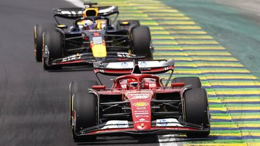 Ferrari's Monegasque driver Charles Leclerc (front) and Red Bull Racing's Dutch driver Max Verstappen compete during the Sprint race at the Jose Carlos Pace racetrack, aka Interlagos, in Sao Paulo, Brazil, on November 2, 2024, on the eve of the Formula One Sao Paulo Grand Prix. 
Miguel Schincariol / AFP