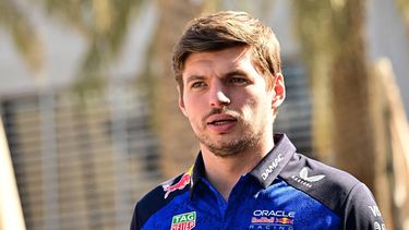 Red Bull Racing's Dutch driver Max Verstappen walks in the paddock on the first day of the second Formula One pre-season test at the Bahrain International Circuit in Sakhir on February 18, 2026.  
Giuseppe CACACE / AFP
