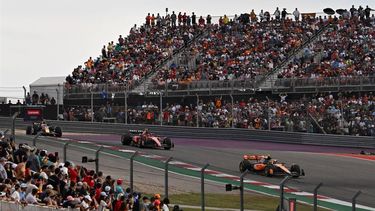 2023-10-22 00:21:38 McLaren's British driver Lando Norris leads Ferrari's Spanish driver Carlos Sainz Jr., and Red Bull Racing's Mexican driver Sergio Perez during the Sprint at the Circuit of the Americas in Austin, Texas, on October 21, 2023, ahead of the United States Formula One Grand Prix. 
Chandan Khanna / AFP