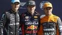 2023-08-26 16:33:57 Mercedes' British driver George Russell (L), Red Bull Racing's Dutch driver Max Verstappen and McLaren's British driver Lando Norris pose after taking the leading positions in the qualifying session at The Circuit Zandvoort, ahead of the Dutch Formula One Grand Prix, in Zandvoort on August 26, 2023. 
SIMON WOHLFAHRT / AFP