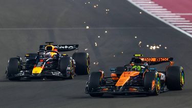 McLaren's British driver Lando Norris and Red Bull Racing's Dutch driver Max Verstappen vie for position during the sprint race ahead of the Formula One Qatar Grand Prix at the Lusail International Circuit in Lusail on November 29, 2025. 
Karim JAAFAR / AFP
