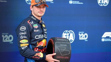 Pole position winner Red Bull's Dutch driver Max Verstappen poses with the pole position award after the qualifying session on the Red Bull Ring race track in Spielberg, Austria, on June 29, 2024, ahead of the Formula One Austrian Grand Prix. 
Jure Makovec / AFP