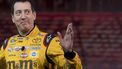 (FILES) 2015 NASCAR Sprint Cup Series Champion Kyle Busch waves as he arrives at the Toyota press conference during the 2017 North American International Auto Show in Detroit, Michigan, on January 9, 2017. NASCAR star Kyle Busch, a two-time Cup series champion regarded as one of the sport's greatest ever drivers, died May 21, 2026 aged 41, his family confirmed in a joint statement. He was in his 22nd season in NASCAR's top division and had been hospitalized earlier Thursday with an undisclosed but 