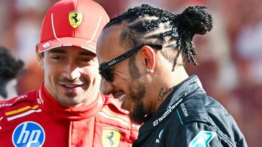 Mercedes' British driver Lewis Hamilton (R) and Ferrari's Monegasque driver Charles Leclerc arrive for a group photo ahead of the Abu Dhabi Formula One Grand Prix at the Yas Marina Circuit in Abu Dhabi on December 8, 2024. 
Andrej ISAKOVIC / AFP