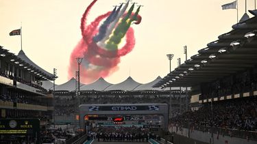 2022-11-20 14:45:00 An aerobatic team performs ahead of the Abu Dhabi Formula One Grand Prix at the Yas Marina Circuit in the Emirati city of Abu Dhabi on November 20, 2022. 
Ben Stansall / AFP