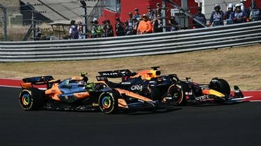 Red Bull Racing's Dutch driver Max Verstappen races ahead of McLaren's British driver Lando Norris during the United States Formula One Grand Prix at the Circuit of the Americas in Austin, Texas, on October 20, 2024. 
ANGELA WEISS / AFP