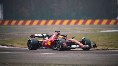 This handout picture released by Ferrari on January 22, 2024 shows F1 driver Lewis Hamilton testing the Ferrari F1SF 75 on the Fiorano circuit, at Maranello. Lewis Hamilton drove a Ferrari Formula One car for the first time today after the seven-time world champion took to the track at the team's test circuit in front of delighted fans. 
Handout / FERRARI / AFP