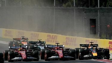 (L-R) Ferrari's British driver Lewis Hamilton, Ferrari's Monegasque driver Charles Leclerc, and Red Bull Racing's Dutch driver Max Verstappen race during the Mexico City Formula One Grand Prix at the Hermanos Rodriguez racetrack in Mexico City on October 26, 2025. 
Carl DE SOUZA / AFP