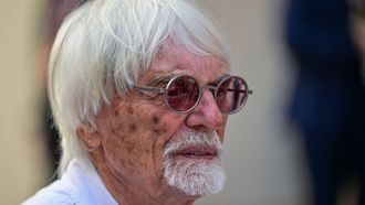 British business magnate and motorsport executive Bernie Ecclestone arrives to attend the qualifying session ahead of the Abu Dhabi Formula One Grand Prix at the Yas Marina Circuit in Abu Dhabi on December 6, 2025. 
Andrej ISAKOVIC / AFP