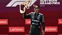Winner Mercedes' British driver George Russell celebrates on the podium with the trophy after the Formula One Austrian Grand Prix at the Red Bull Ring race track in Spielberg, Austria on June 28, 2026. 
Joe Klamar / AFP