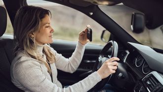 filmen tijdens het rijden, boete?
