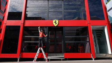 A Ferrari staff member cleans the Ferrari building in the paddock ahead of the Formula One Belgian Grand Prix at the Spa-Francorchamps Circuit in Spa, on July 25, 2024. 
SIMON WOLFHART / STR / AFP