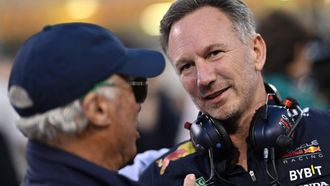 Red Bull Racing team principal Christian Horner (R) speaks while waiting for the start of the Bahrain Formula One Grand Prix at the Bahrain International Circuit in Sakhir on March 2, 2024. 
ANDREJ ISAKOVIC / AFP