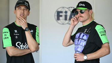 Kick Sauber's Chinese driver Zhou Guanyu and Kick Sauber's Finnish driver Valtteri Bottas attend the drivers' presentation prior to the Formula One Azerbaijan Grand Prix at the Baku City Circuit in Baku on September 15, 2024. 
Natalia KOLESNIKOVA / AFP
