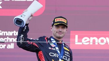 2023-09-24 15:54:51 epa10880001 Dutch Formula One driver Max Verstappen of Red Bull Racing celebrates with the trophy after winning the Formula One Japanese Grand Prix at Suzuka Circuit racetrack in Suzuka, Japan, 24 September 2023.  EPA/FRANCK ROBICHON