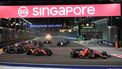 2023-09-17 20:03:43 epa10866062 Spanish Formula One driver Carlos Sainz (front R) and Monaco's Formula One driver Charles Leclerc (front 2-L) of Scuderia Ferrari in action during the Singapore Formula One Grand Prix race at the Marina Bay Street Circuit, Singapore, 17 September 2023.  EPA/TOM WHITE