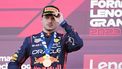 2023-09-24 15:52:38 epa10879983 Dutch Formula One driver Max Verstappen of Red Bull Racing adjusts his cap after winning the Formula One Japanese Grand Prix at Suzuka Circuit racetrack in Suzuka, Japan, 24 September 2023.  EPA/FRANCK ROBICHON