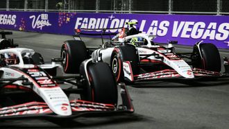 (L/R) Haas F1 Team's French driver Esteban Ocon and Haas F1 Team's British driver Oliver Bearman race during the second practice session for the Las Vegas Formula One Grand Prix at the Las Vegas Strip Circuit in Las Vegas, Nevada, on November 20, 2025. 
Frederic J. Brown / AFP