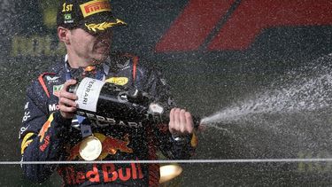 2023-11-05 21:20:47 Red Bull Racing's Dutch driver Max Verstappen celebrates on the podium after winning the Formula One Brazil Grand Prix at the Autodromo Jose Carlos Pace racetrack, also known as Interlagos, in Sao Paulo, Brazil, on November 5, 2023.  
DOUGLAS MAGNO / AFP
