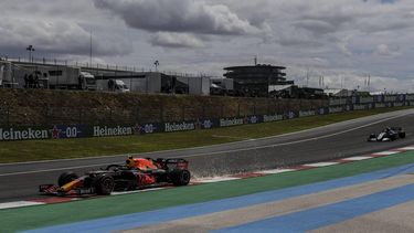 Red Bull's Mexican driver Sergio Perez (L) takes part in the third practice session of the Portuguese Formula One Grand Prix at the Algarve International Circuit in Portimao on May 1, 2021.  
PATRICIA DE MELO MOREIRA / AFP
