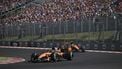 epa13134074 McLaren driver Oscar Piastri of Australia (L) and teammate Lando Norris of Britain in action during the Formula One Hungarian Grand Prix at the Hungaroring circuit in Mogyorod, Hungary, 26 July 2026.  EPA/Tamas Vasvari HUNGARY OUT