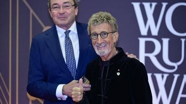 Irish businessman Eddie Jordan (R) poses on the red carpet of the 2024 World Rugby Awards ceremony at the Sporting Monte-Carlo complex in Monaco, on November 24, 2024. 
Frederic Dides / AFP