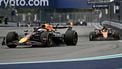 Red Bull Racing's Dutch driver Max Verstappen races ahead of McLaren's Australian driver Oscar Piastri during the 2025 Miami Formula One Grand Prix at Miami International Autodrome in Miami Gardens, Florida, on May 4, 2025.  
Chandan Khanna / AFP