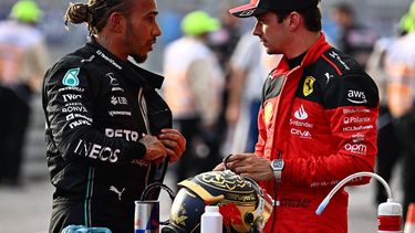 2023-10-22 00:42:17 Mercedes' British driver Lewis Hamilton (L) speaks with Ferrari's Monegasque driver Charles Leclerc after the Sprint race at the Circuit of the Americas in Austin, Texas, on October 21, 2023 ahead of the United States Formula One Grand Prix. Hamilton placed second with Leclerc finishing third.

Chandan Khanna / AFP