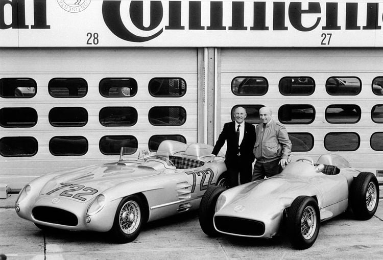 Sir Stirling Moss (links) en Juan Manuel Fangio 1961