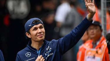 Williams' Thai driver Alexander Albon waves as he arrives ahead of the Formula One Chinese Grand Prix race at the Shanghai International Circuit in Shanghai on April 21, 2024. 
PEDRO PARDO / AFP