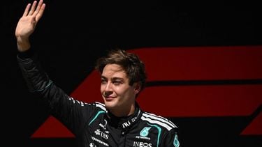 Mercedes' British driver George Russell celebrates winning the sprint race ahead of the Formula One Chinese Grand Prix at the Shanghai International Circuit in Shanghai on March 14, 2026. 
JADE GAO / AFP