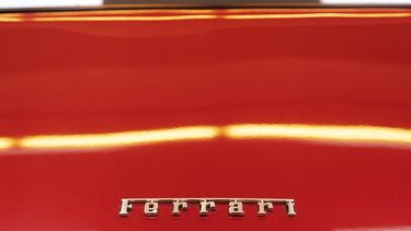 Detail view of the 1973 Ferrari 365 GT4 2+2 car once owned by Austrian Formula One driver Niki Lauda standing in the hall of the Dorotheum auction house in Voesendorf near Vienna, Lower Austria, on December 6, 2022. The 1973 Ferrari 365 GT4 2+2 will be auctioned off online on Wednesday, December 7, 2022, with current bids already at almost triple the starting price of 30,000 euro ($31,500). Three-time Formula One world champion Niki Lauda received the car in 1973 after signing on with Ferrari as F1 driver. Originally silver colour, a subsequent owner changed the Ferrari's colour to red. Austrian F1 legend Lauda died in 2019 at the age of 70.
Alex HALADA / AFP