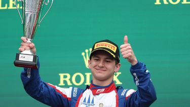 Second-placed Trident's Italian driver Leonardo Fornaroli celebrates on the podium after the Australia Formula 3 Grand Prix at the Albert Park Circuit in Melbourne on March 24, 2024. 
Martin KEEP / AFP
