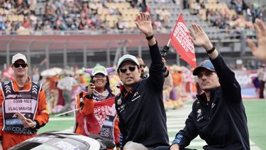 epa11687810 Red Bull Racing team drivers Sergio Perez (L) and Max Verstappen (R) take part in the Drivers Parade ahead of the Formula One Grand Prix of Mexico City at the Hermanos Rodriguez racetrack in Mexico City, Mexico, 27 October 2024.  EPA/JOSE MENDEZ