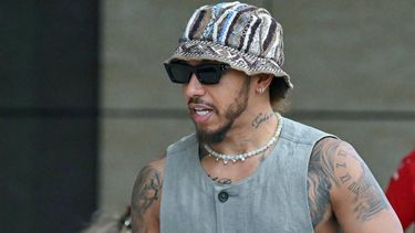 Mercedes' British driver Lewis Hamilton arrives at Lusail International Circuit in Lusail, north of Doha, ahead of the first practice session of the Qatari Formula One Grand Prix on November 29, 2024. 
Andrej ISAKOVIC / AFP