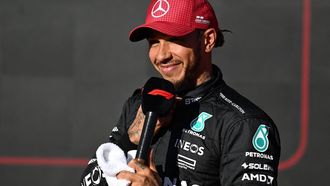 2023-10-21 00:29:40 Mercedes' British driver Lewis Hamilton is interviewed after the qualifying session for the 2023 United States Formula One Grand Prix at the Circuit of the Americas in Austin, Texas, on October 20, 2023.  Hamilton won pole position 3
Jim WATSON / AFP