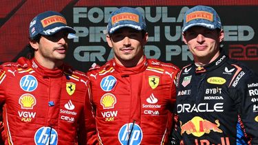 (L-R) Second place, Ferrari's Spanish driver Carlos Sainz Jr.; winner, Ferrari's Monegasque driver Charles Leclerc and third place, Red Bull Racing's Dutch driver Max Verstappen stand on the podium after the United States Formula One Grand Prix at the Circuit of the Americas in Austin, Texas, on October 20, 2024. 
ANGELA WEISS / AFP