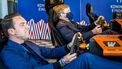 epa09163182 Former driver Robert Doornbos rides an E-Race together with King Willem-Alexander in Eindhoven, the Netherlands, 27 April 2021. The royal family visits the High Tech Campus during the 8th edition of King's Day.  EPA/Koen van Weel