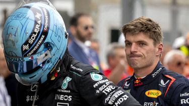 MONZA - (l-r) George Russell (Mercedes) en Max Verstappen (Red Bull Racing) na afloop van de Grote Prijs van Italie op het circuit van Monza. ANP SANDER KONING