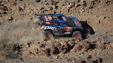 Spanish driver Carlos Sainz and co-driver Lucas Cruz compete in Stage 1 of the Dakar Rally 2025, between Bisha and Bisha, Saudi Arabia, on January 4, 2025. 
Valery HACHE / AFP