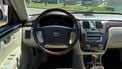 Cadillac DTS occasion tweedehands auto Warren Buffett