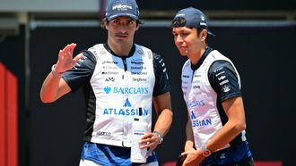Williams' Spanish driver Carlos Sainz (L) and Williams' Thai driver Alexander Albon are pictured prior to the Formula One Austrian Grand Prix at the Red Bull Ring race track in Spielberg, Austria on June 28, 2026. 
Andrej ISAKOVIC / AFP