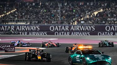 2023-10-08 19:11:47 The safety car leads the field during the Qatari Formula One Grand Prix at Lusail International Circuit on October 8, 2023. 
Ben Stansall / AFP