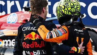McLaren's British driver Lando Norris (R) is congratulated by Red Bull Racing's Dutch driver Max Verstappen after winning the 2024 Miami Formula One Grand Prix at Miami International Autodrome in Miami Gardens, Florida, on May 5, 2024.  
Giorgio Viera / AFP