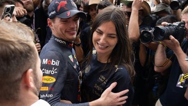 Red Bull Racing's Dutch driver Max Verstappen (C) hugs his girlfriend Kelly Piquet as the Red Bull Racing team celebrates winning the Constructors title and the Formula One United States Grand Prix, at the Circuit of the Americas in Austin, Texas, on October 23, 2022. 
Jim WATSON / AFP